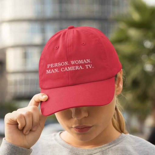 Person Woman Man Camera TV hat